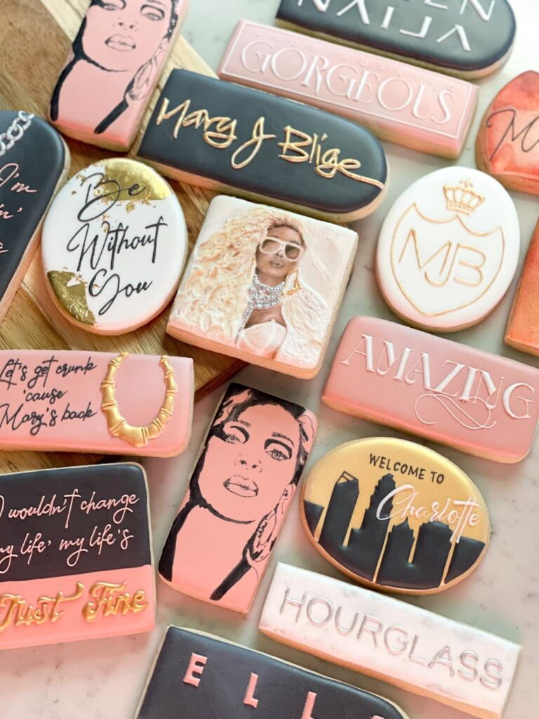 Cookies for Mary J. Blige: A sweet tribute featuring a hand-painted portrait cookie capturing the likeness of the iconic singer. Surrounding the portrait are intricately designed cookies showcasing lyrics and names of her famous songs, creating a delectable homage to Mary J. Blige's musical legacy